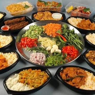 A catering platter of Indian dishes prepared by Shehnai Restaurant